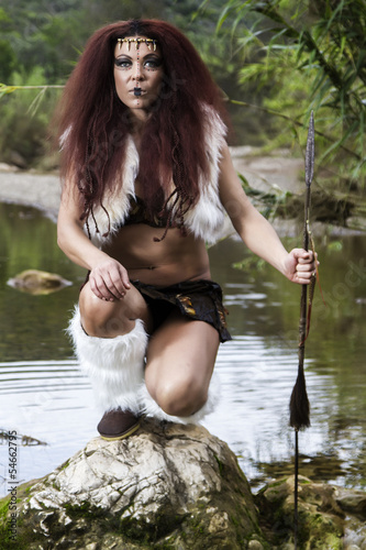 Fototapeta Naklejka Na Ścianę i Meble -  beautiful young strong hunter warrior woman