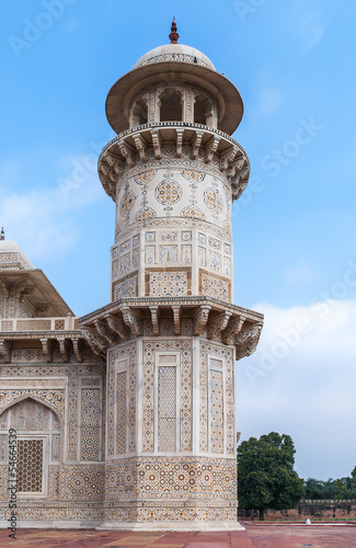 Marble minaret of Agra's Baby Taj mausoleum in India.