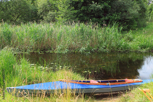 Kayak on the river bank