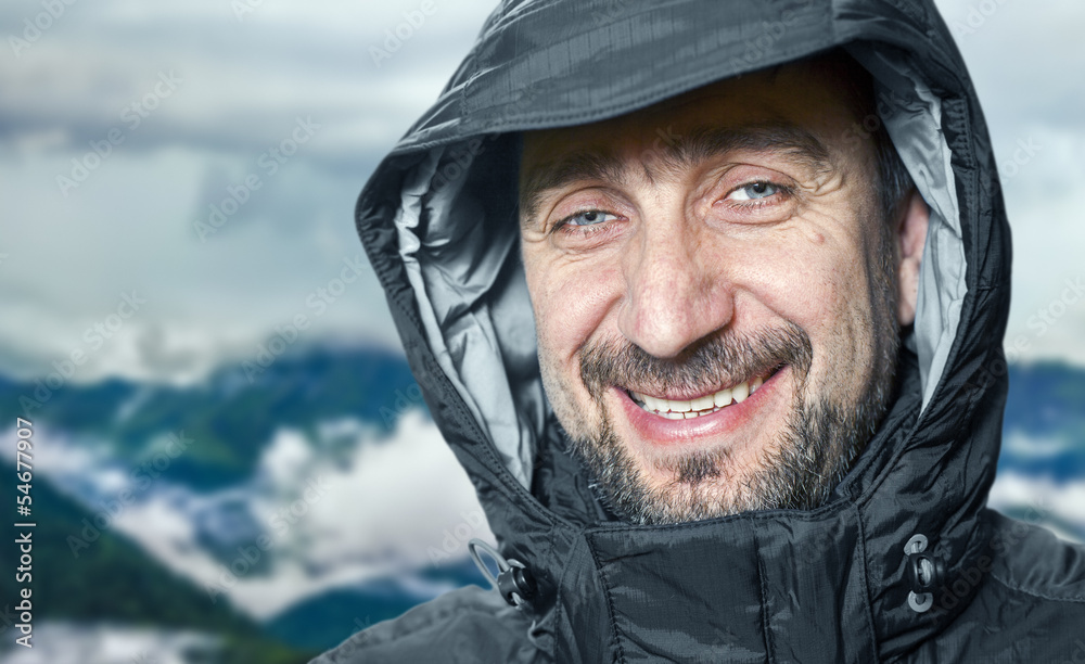 Man after climbing on the mountain Man after climbing on the mountain