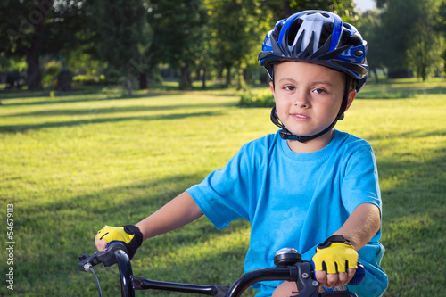 Little boy riding a bike