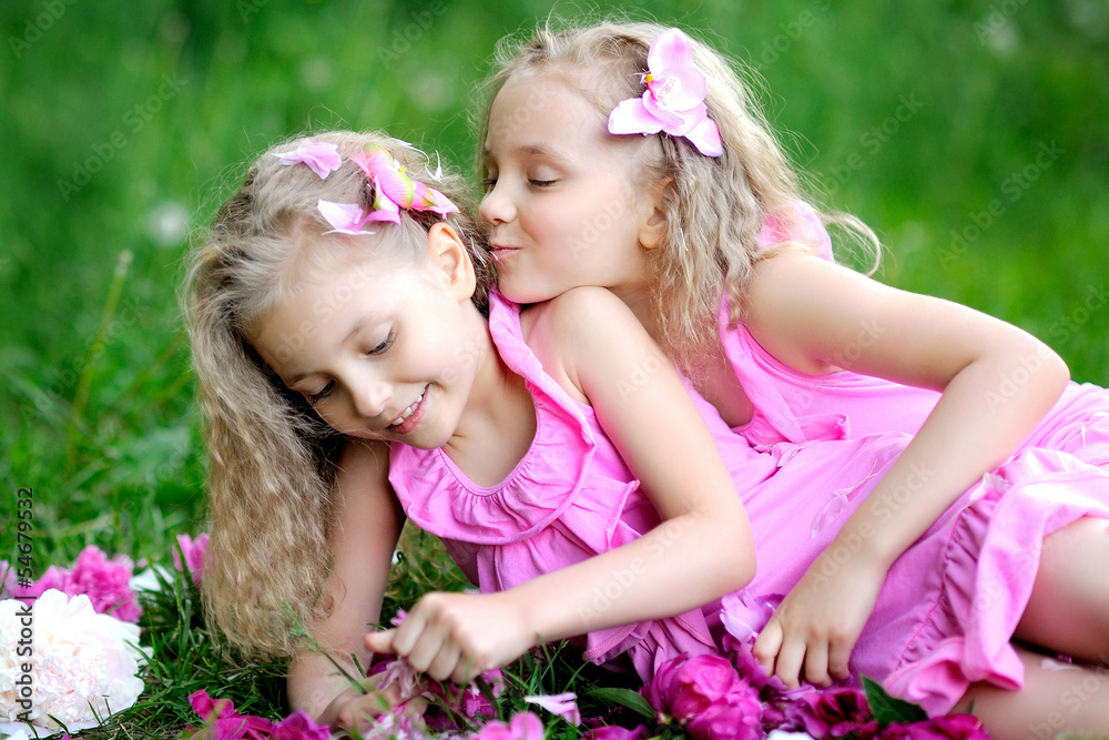 portrait of two twins with peonies portrait of two twins with peonies