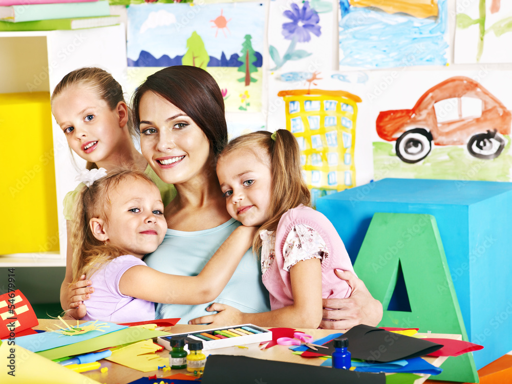 Fototapeta premium Children with teacher at school.