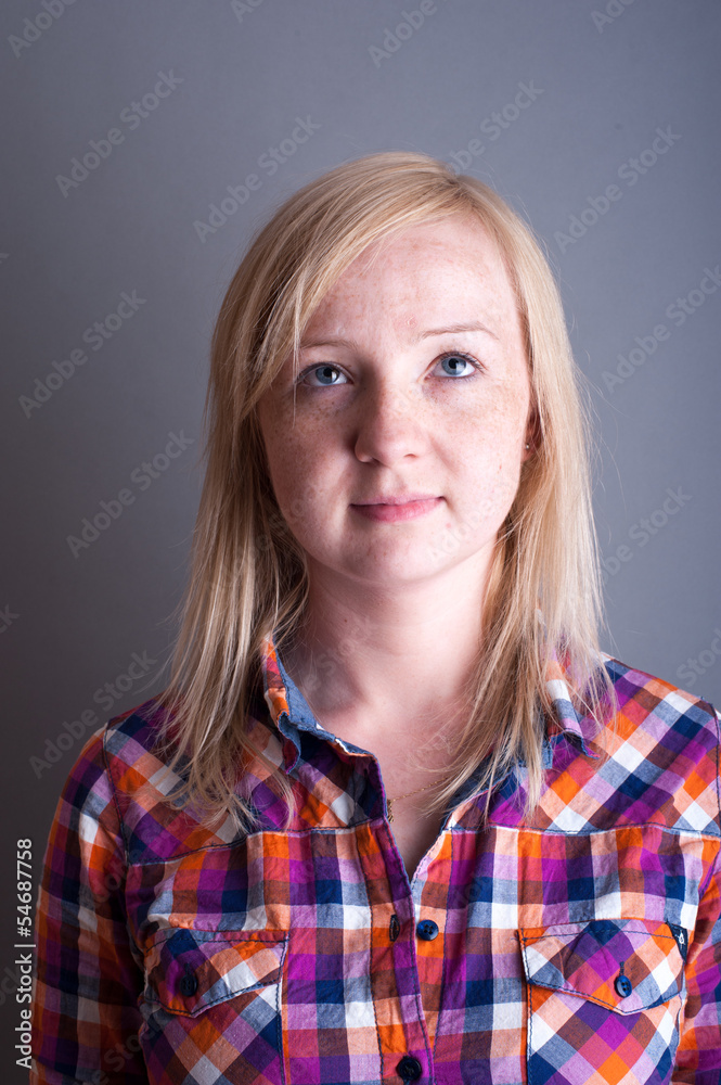 Studio portrait of freckled blonde Studio portrait of freckled blonde