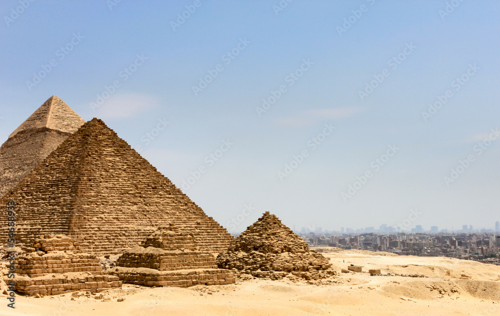 Pyramids in Egypt with the city of Cairo in the background Pyramids in Egypt with the city of Cairo in the background