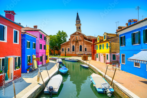 Venice landmark, Burano canal, houses, church and boats, Italy © stevanzz