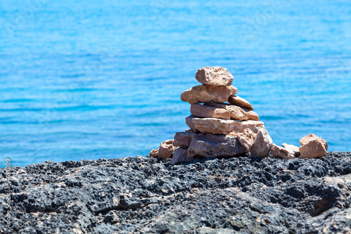 Stack of stones on a seashore.