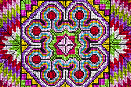 Colorful cross-stitch cloth background