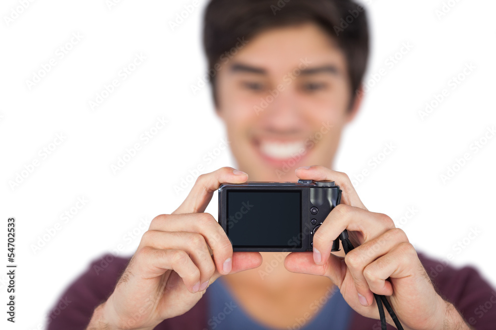 Young man taking picture of himself Young man taking picture of himself