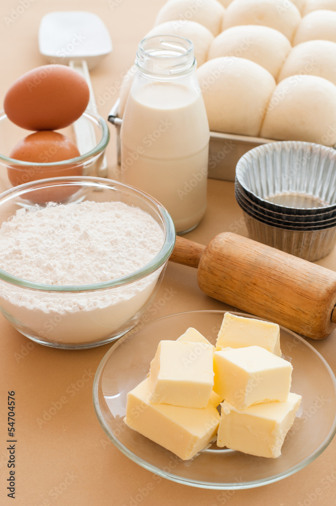 Baking ingredients with bread dough in tin. Baking ingredients with bread dough in tin.