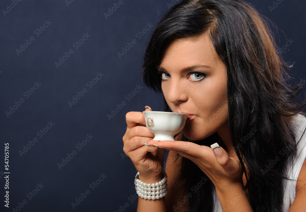 Beautiful woman with a cup of coffee. Beautiful woman with a cup of coffee.