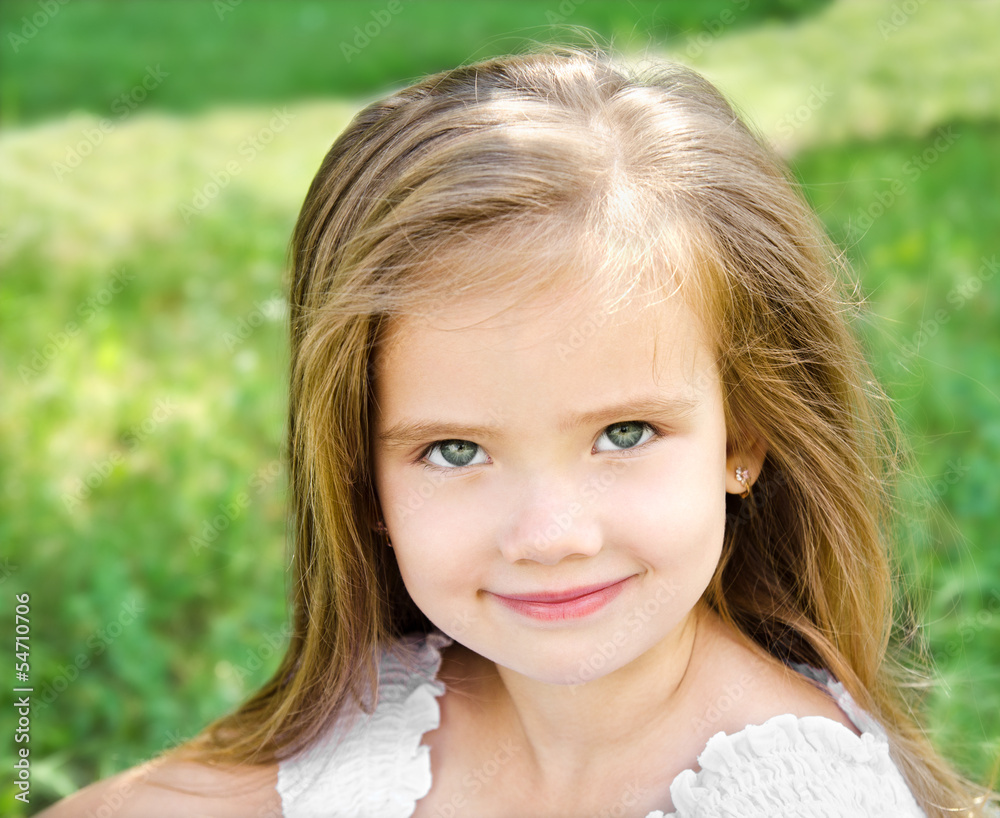 Outdoor portrait of adorable smiling little girl Outdoor portrait of adorable smiling little girl
