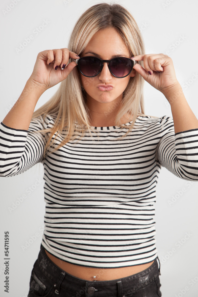 Portrait of a young woman with sunglasses Portrait of a young woman with sunglasses
