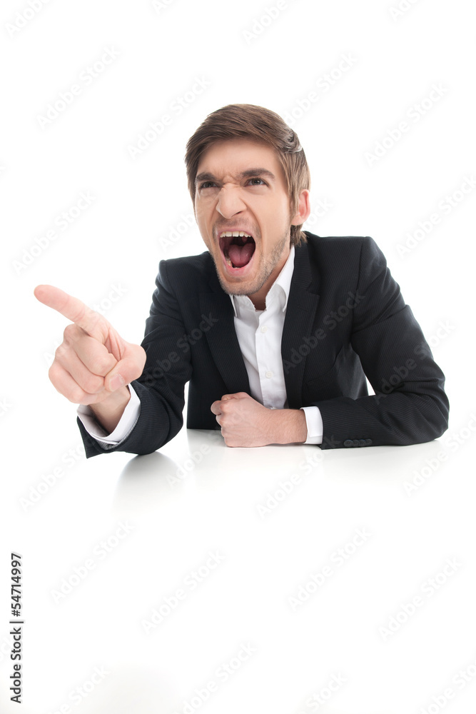 Angry businessman. Angry young businessman shouting and pointing Angry businessman. Angry young businessman shouting and pointing