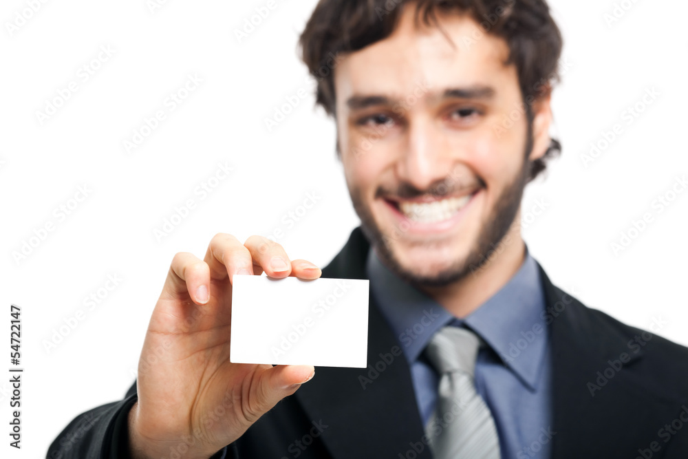 Smiling businessman showing a blank card Smiling businessman showing a blank card