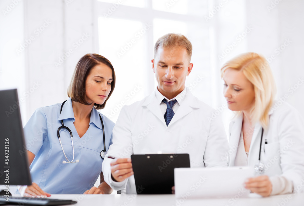 team or group of doctors on meeting team or group of doctors on meeting