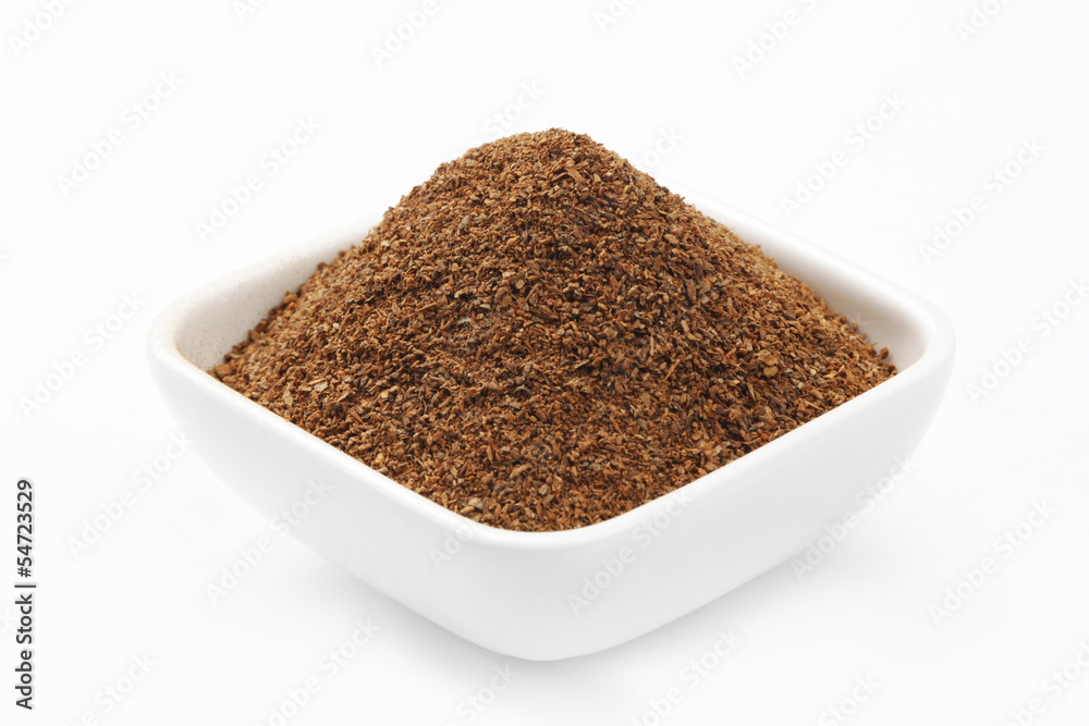 Cinnamon Powder in a square Bowl. Cinnamon Powder in a square Bowl.