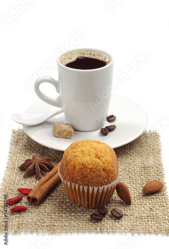 Small cupcake and cup of coffee
