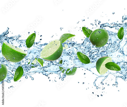 Limes and Splashing water over white