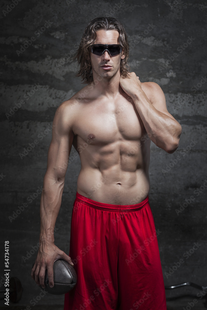 bare chested muscle man with sunglasses