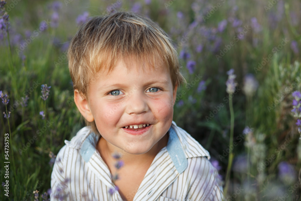 Little boy in lavender field. Outdoor summer portrait. Little boy in lavender field. Outdoor summer portrait.