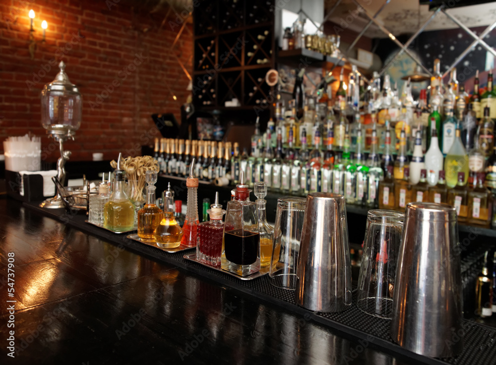 Bitters and infusions on bar counter Bitters and infusions on bar counter