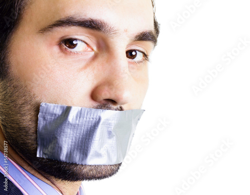 Businessman with duct tape on mouth