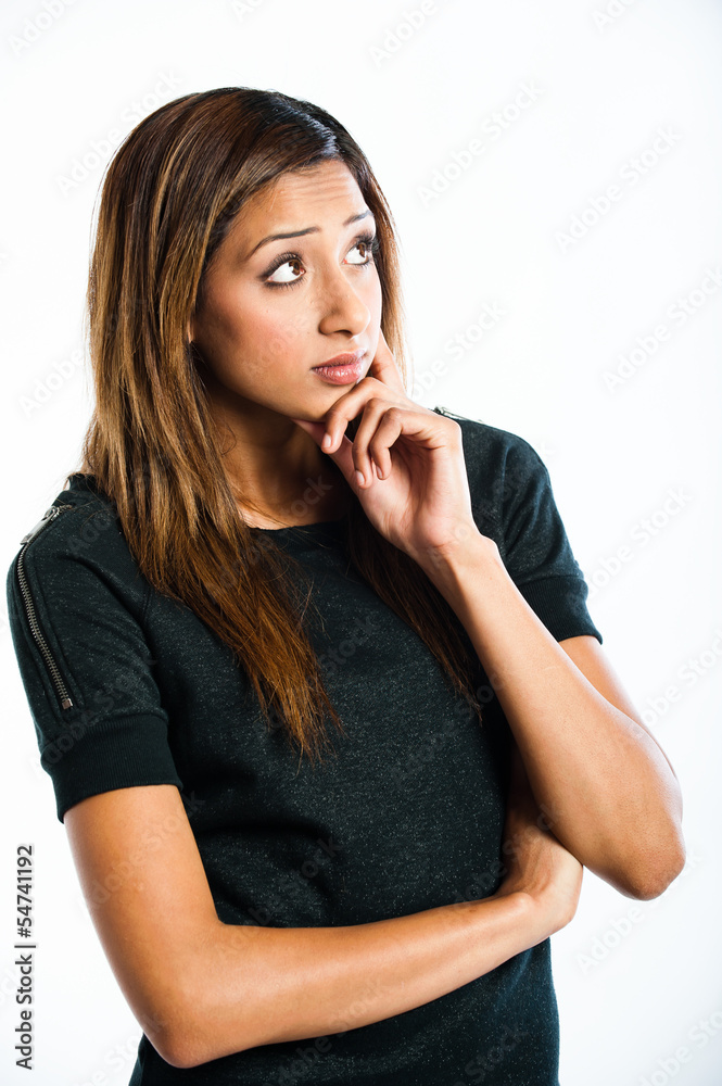 Beautiful young Indian model in a thoughtful pose Beautiful young Indian model in a thoughtful pose