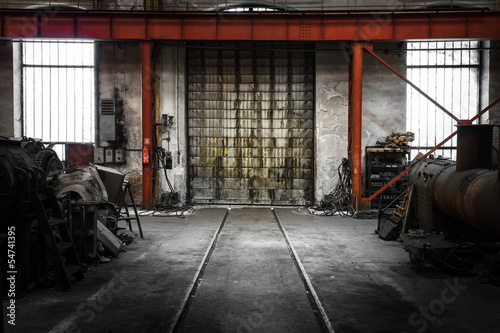 old metal gate in vehicle repair station
