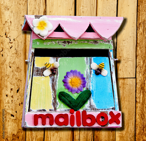 The Old wooden of mailbox on wood background