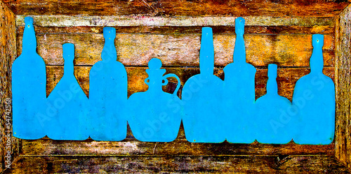 The Sign bottle of liquor on wood