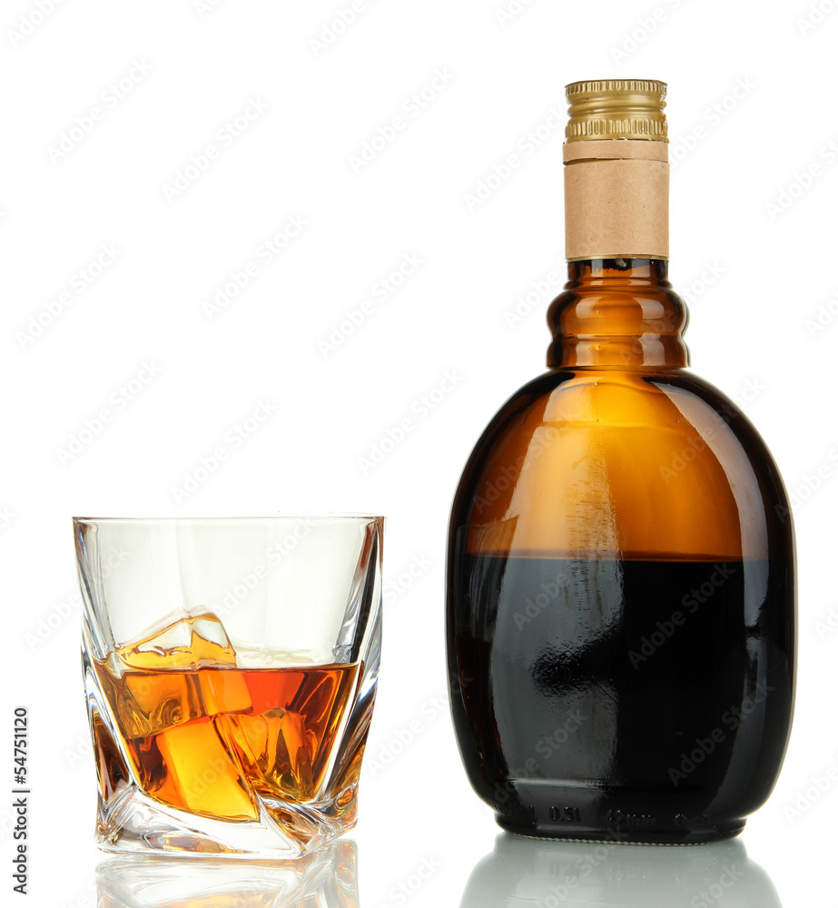 Glass of liquor with bottle, isolated on white Glass of liquor with bottle, isolated on white