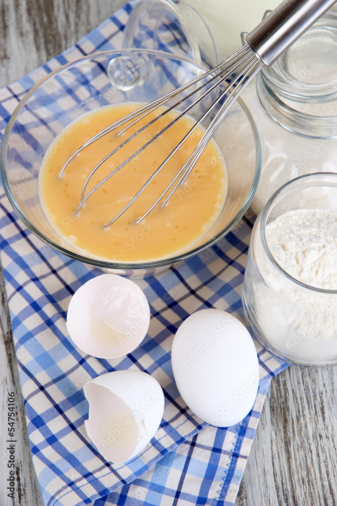 Ingredients for dough on wooden table close-up Ingredients for dough on wooden table close-up