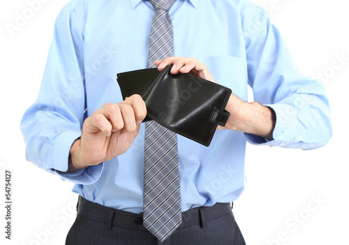 Business man showing his empty purse, isolated on white