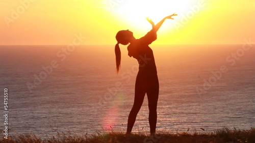 A young woman stands on therock, vacation vitality healthy photo