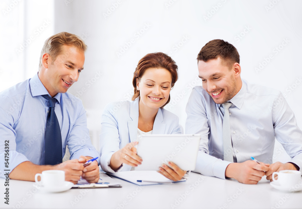 business team looking at tablet pc in office business team looking at tablet pc in office
