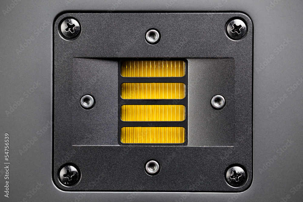 Fototapeta premium yellow tweeter - high-frequency loudspeaker, closeup