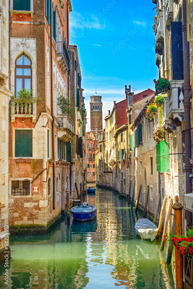 Venice cityscape, water canal, church and buildings. Italy