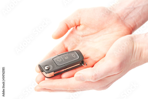 Hands giving or receiving a car key