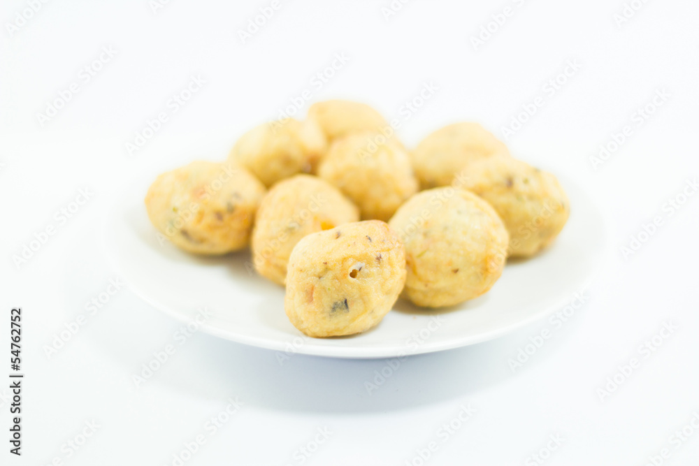 closeup of thai meatballs on white background closeup of thai meatballs on white background