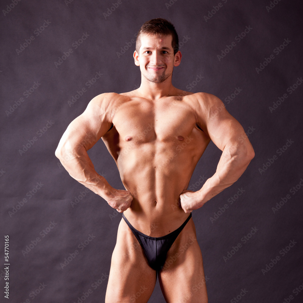 Fototapeta premium young bodybuilder posing