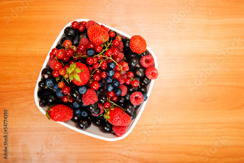 Blueberry, strawberry, raspberry, black and red currant in bowl