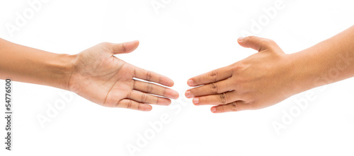 Two female hands about to shake hands