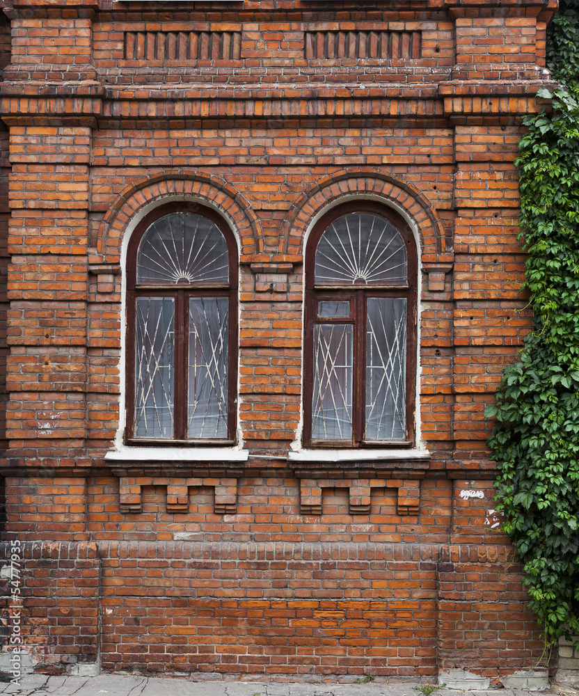 wall with windows of an old building wall with windows of an old building