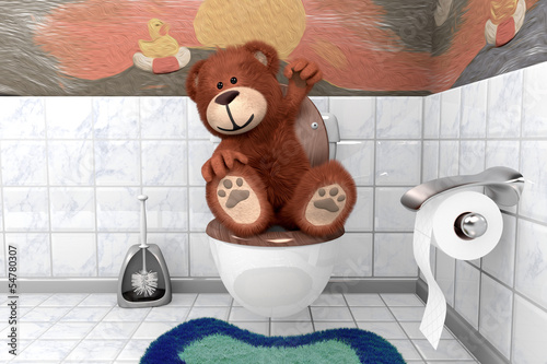 süsser kuscheliger Teddybär hat es geschafft auf Kloschüssel