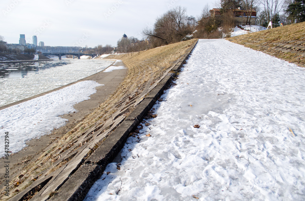 frosted walking trail along river cold winter day frosted walking trail along river cold winter day