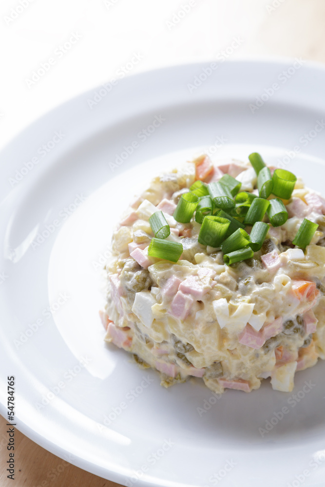 russian salad olivier served with onion russian salad olivier served with onion