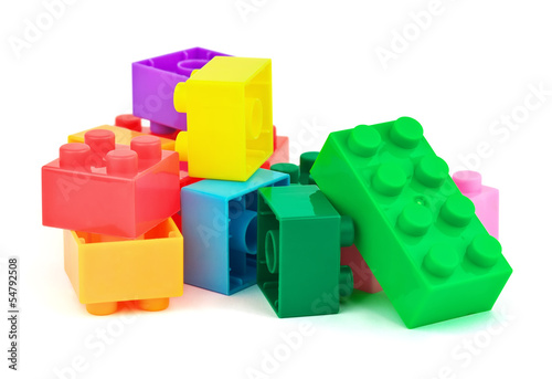 Toy colorful plastic blocks on white background