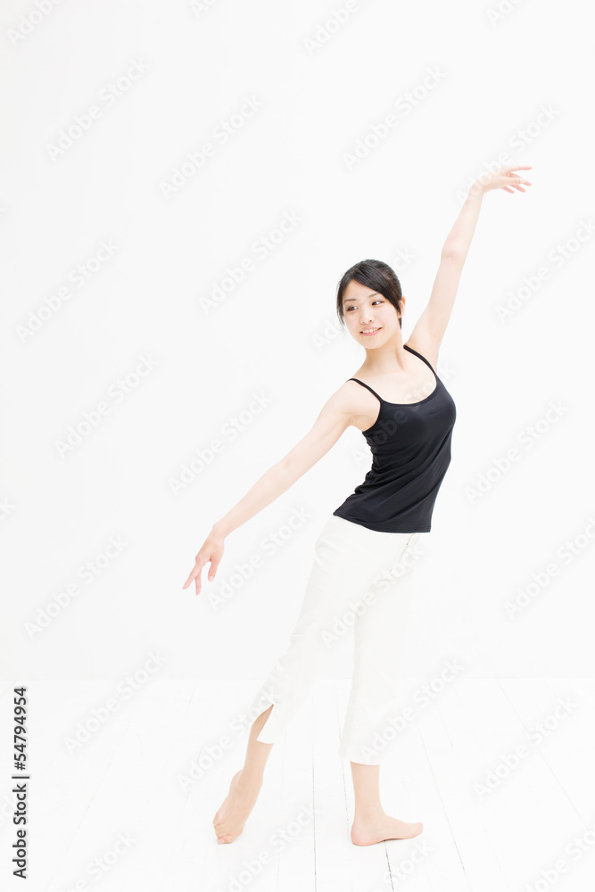 attractive asian woman exercising on white background
