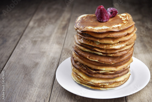 Pile of pancakes in the white plate